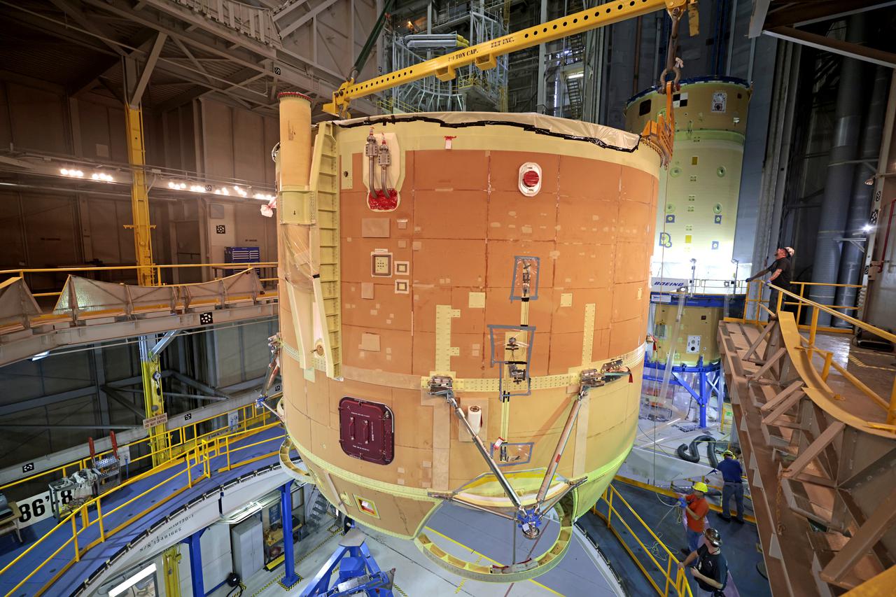 Technicians at NASA’s Michoud Assembly Facility have joined the engine and boat-tail sections of NASA’s Space Launch System rocket for Artemis II in preparation for its next step in production. When complete, the engine section will house the four RS-25 engines and include vital systems for mounting, controlling and delivering fuel from the propellant tanks to the rocket’s engines. The boat-tail is designed to protect the bottom end of the core stage and the RS-25 engines and was joined with the engine section to comprise the lowest portion of the 212-foot-tall core stage. Together with its four RS-25 engines and its twin solid rocket boosters, it will produce 8.8 million pounds of thrust to send NASA’s Orion spacecraft, astronauts, and supplies beyond Earth’s orbit to the Moon and, ultimately, Mars. Offering more payload mass, volume capability, and energy to speed missions through space, the SLS rocket, along with NASA’s Gateway in lunar orbit, the Human Landing System, and Orion spacecraft, is part of NASA’s backbone for deep space exploration and the Artemis lunar program. No other rocket is capable of carrying astronauts in Orion around the Moon in a single mission.